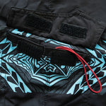 Inside the HIC Kanaha pocket: hook-and-loop closure and a red key string